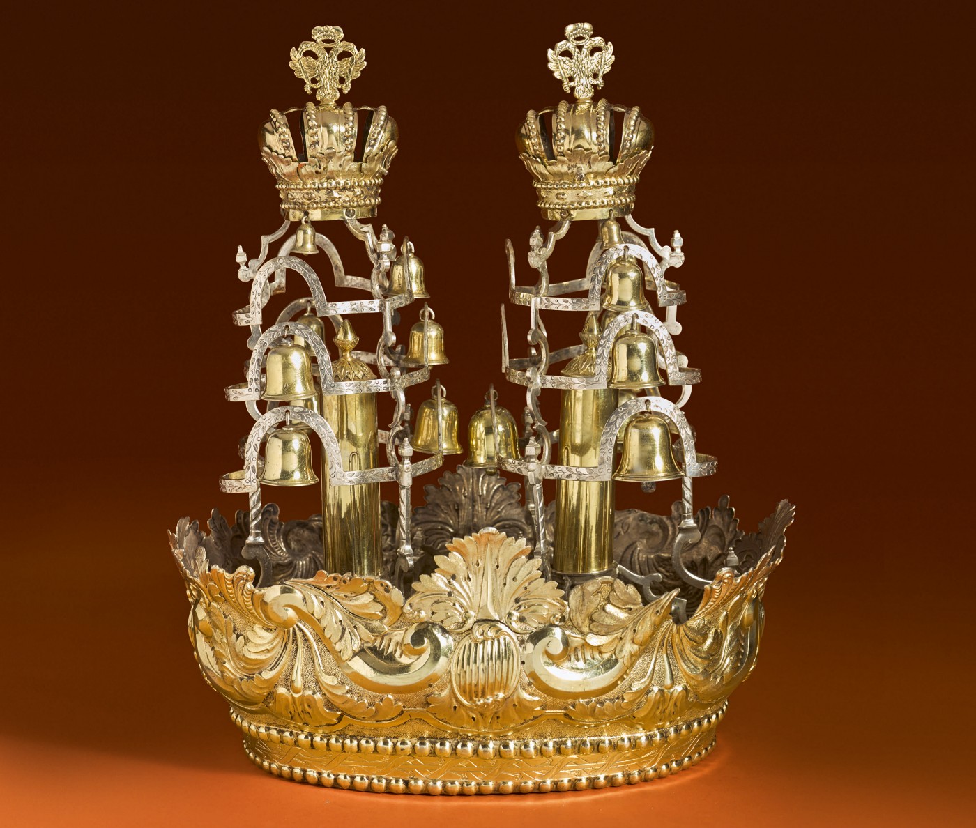 A Rare and Large Hungarian Parcel-Gilt Silver Set of Torah Crown and Pair Of Finials