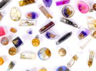 Various resin charms of different shapes and colors on a white background.