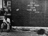 Darryl Cowherd. Stop White Police from Killing Us – St. Louis, MO, c. 1966-67. Gelatin Silver Print. Image: 15 x 19 in., mat: 20 x 24 ¼ in., paper 16 x 20 in.