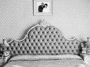 black and white photo of a bed 