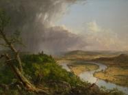 View of the painting described in this story. A knarled tree sits in the foreground of the left corner and a storm rages in the distance of this same half. 