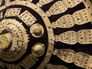 Ethiopian artist, Ethiopia, detail of Shield, 19th - 20th century. Brass, cloth, and animal hide. Collection of Drs. John and Nicole Dintenfass. Photo by Nia Bowers.