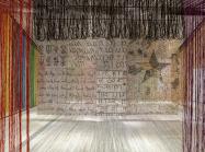 Installation photograph, featuring a detail of Gu Wenda's United Nations: American Code (2018-2019)