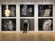 Sarah Amos in front of "Sarah Amos: Chalk Lines" at CUE Art Foundation