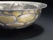 A very rare and important large parcel-gilt silver bowl, Tang dynasty (AD 618-907). Diameter 9⅝ in. Sold for $3,495,000.