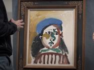 Sygnum Co-Founder & Group CEO Mathias Imbach and Artemundi CEO Javier Lumbreras stand with Picasso's Fillette au béret.