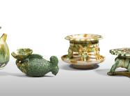 several ceramic objects with white background