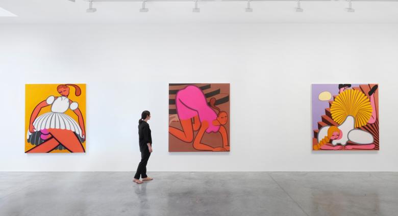 three large paintings by Grace Weaver in a white gallery with one person looking at them