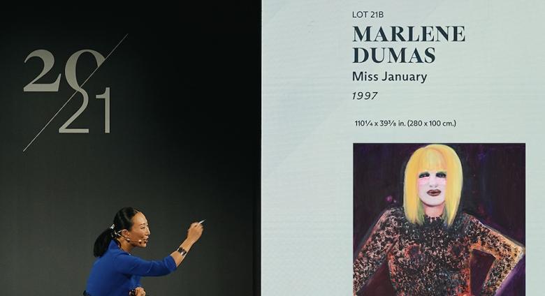 Auctioneer Yu-Ge Wang sells Miss January by Marlene Dumas for $13.6 million.