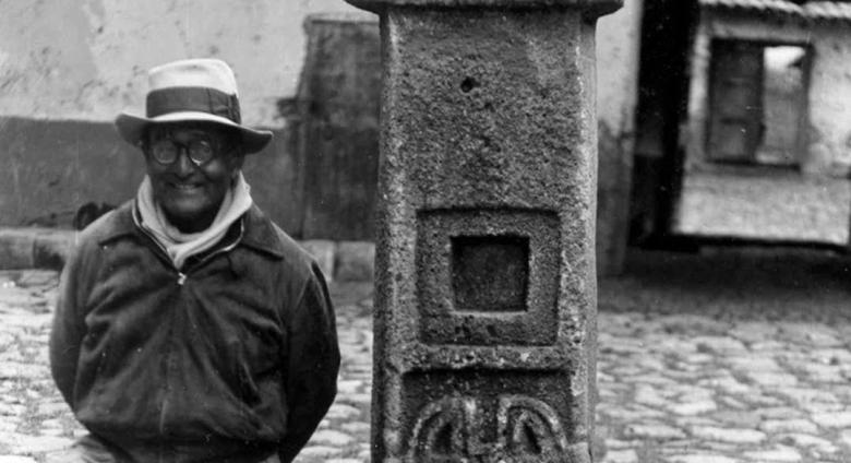 Detail of Peruvian archaeologist Julian C. Tello photographed standing next to the Tello Obelisk, named for his discovery.
