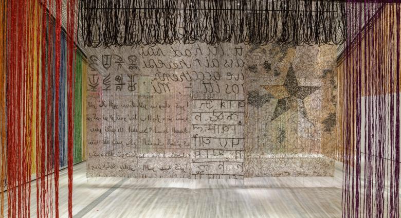 Installation photograph, featuring a detail of Gu Wenda's United Nations: American Code (2018-2019)