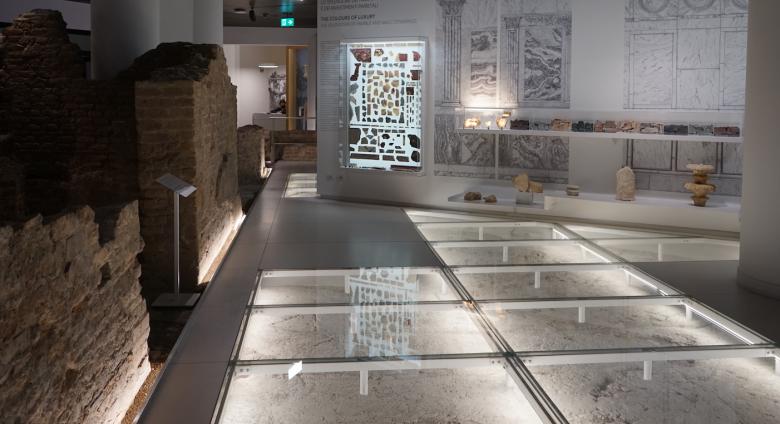 Interior View of Museo Ninfeo. Photo by Christopher Siwicki.One can see glass covered sections of floor scattered through the museum that reveal archeological sites
