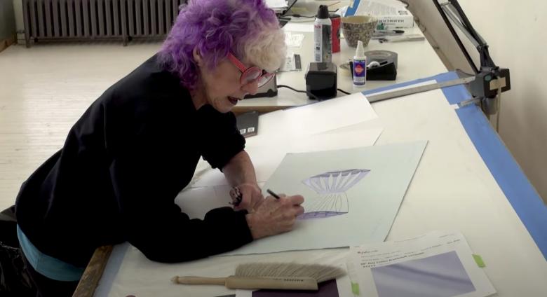 Judy Chicago in her studio working on paper