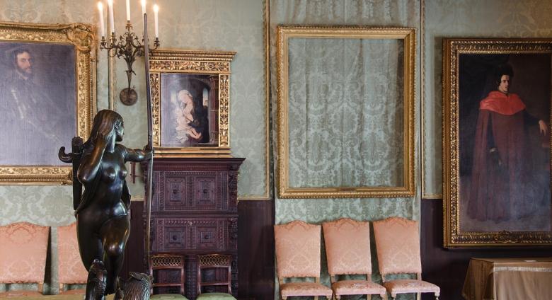 Photo of the empty frame where The Storm on the Sea of Galilee was once displayed at the Isabella Stewart Gardner Museum. March 2018. Wikimedia Commons. Photo by the Federal Bureau of Investigation. r