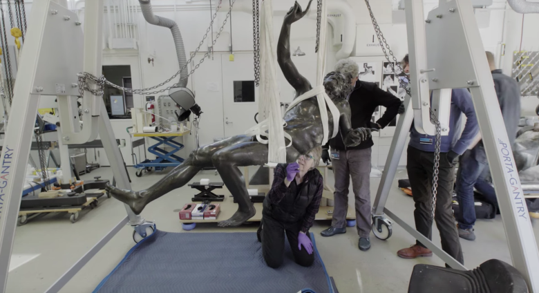 conservationists at work on The Drunken Satyr 