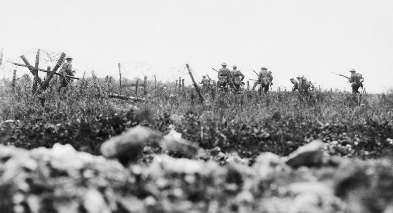 soldiers in distance with guns