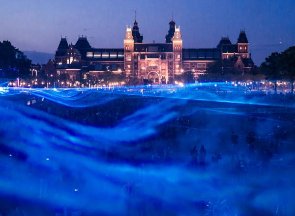 Waterlicht, 2015–present, LEDs, software, lenses, humidity, installation view at Museumplein, Amsterdam, 2015. Artwork © Daan Roosegaarde