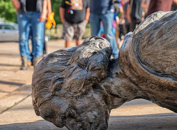 "The fallen Christopher Columbus statue outside the Minnesota State Capitol after a group led by American Indian Movement members tore it down in St. Paul, Minnesota, on June 10, 2020." 
