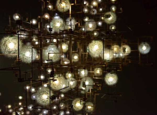 Studio Drfit, Fragile Future 3. Dandelion seeds, metal electrical circuits, LED lights.