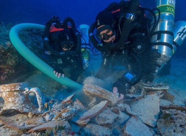  Divers work to recover and study remains from the Antikythera shipwreck in 2012.