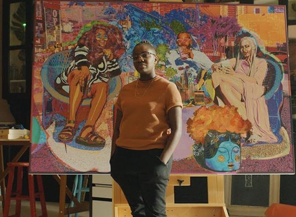 Artist Amani Lewis stands in front of work in promo video for google partnership to promo black-owned businesses