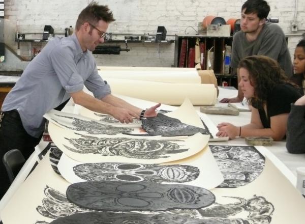 Printmaker Bill Fick with his prints at Maryland Institue College of Art (MICA).