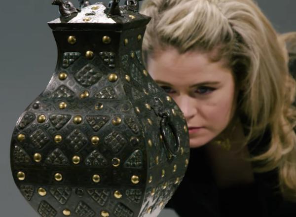 Expert looks at bronze vessel 