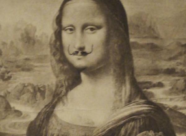 An early draft of Duchamp's mustachioed mona lisa. She is tapped on a background, etc. 