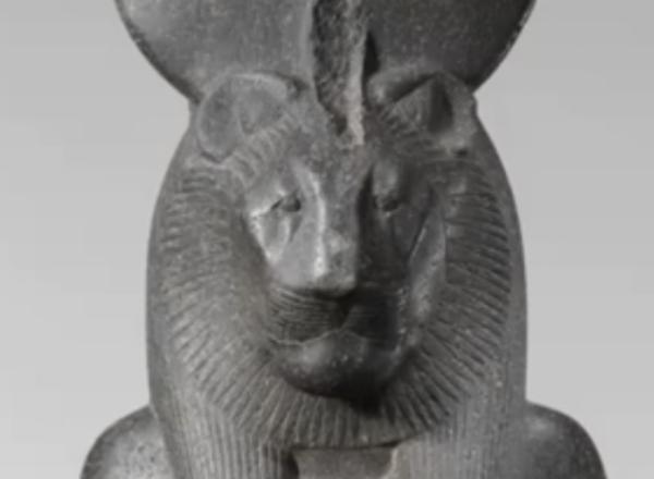 statue standing with lion for a head