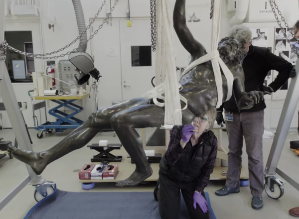 conservationists at work on The Drunken Satyr 