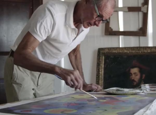 Ken Perenyi working on painting