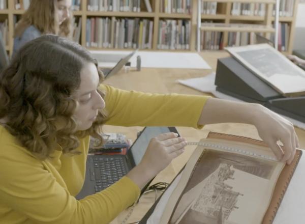 cataloguers at work on photography