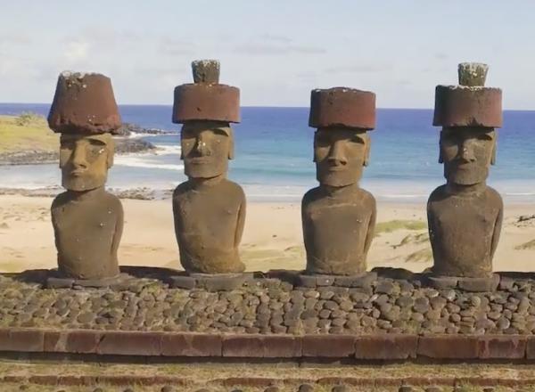 Easter Island heads in front of beach