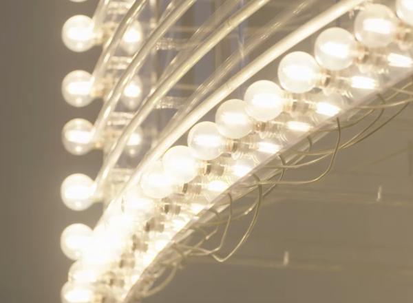 installation art piece composed of rows of lightbulbs that alternately light up.