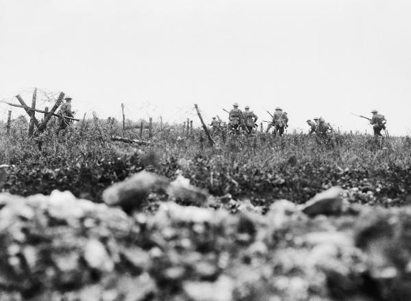 soldiers in distance with guns