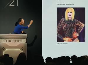 Auctioneer Yu-Ge Wang sells Miss January by Marlene Dumas for $13.6 million.
