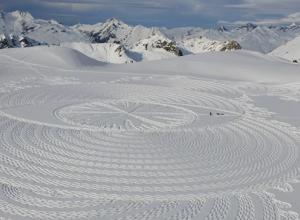 footprints in the snow make a geometric pattern by artist Simon Beck