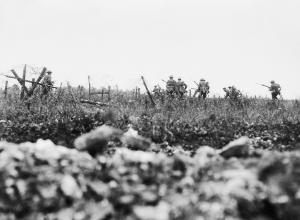 soldiers in distance with guns