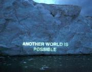 Another World is Possible, Ice Text projection, David Buckland.