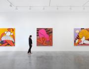 three large paintings by Grace Weaver in a white gallery with one person looking at them