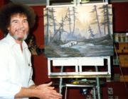 5. Bob Ross- Happy Accidents, Betrayal & Greed - Production Still of Bob Ross with a finished painting.