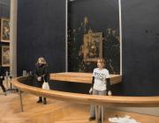 Protesters from the group Riposte Alimentaire after splashing pumpkin soup on the Mona Lisa.