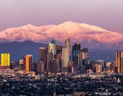 la skyline in front of mountains 