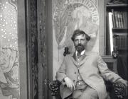 Alphonse Mucha, detail of Self-portrait with posters for Sarah Bernhardt at the studio in rue du Val-de-Grâce, Paris, circa 1901. Modern print from original glass plate negative. 9 7/16 × 7 1/16 in.