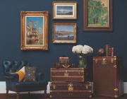 travel trunks and paintings