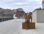 Installation View of Whitney Biennial 2022: Quiet as It's Kept featuring view of rooftop works by Charles Ray