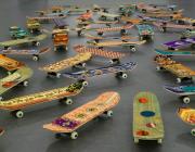 Mounir Fatmi, Maximum Sensation, 2010. Fifty skateboards, plastic, metal, textile, 5 × 8 × 31 11/16 in. (12.7 × 20.3 ×80.5 cm). Brooklyn Museum.