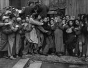 Gold Rush. At the end of the day, scrambles in front of a bank to buy gold. The last days of Kuomintang, Shanghai, 23 December 1948.
