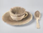 Meret Oppenheim. Object (Objet). 1936. Fur-covered cup, saucer, and spoon. Cup 4 3/8″ (10.9 cm) in diameter; saucer 9 3/8″ (23.7 cm) in diameter; spoon 8″ (20.2 cm) long, overall height 2 7/8″ (7.3 cm).