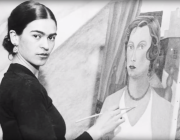 Frida Kahlo working on a painting
